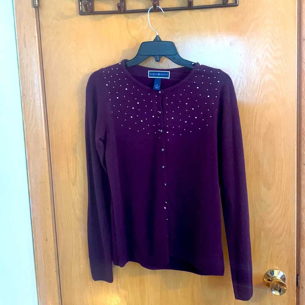 Purple long sleeve sweater with rhinestones never worn